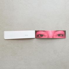 a bookmark with an image of a woman's face on it