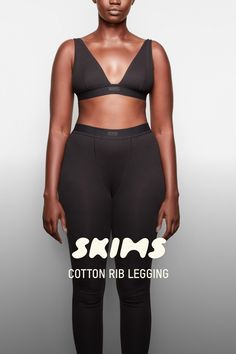 The legging taking over your feed. Made with our iconic ribbed cotton that everyone craves, this breathable style is the cutest, most comfortable legging you’ll ever wear. Features a smooth elastic waist with a SKIMS logo label at the center front and banded cuffs at the hem. Fits true to size. Pair with the Cotton Rib Tank or Plunge Bralette for the matching set. | SKIMS Legging | Black | 2XS | Cotton Rib High Stretch Seamless Cotton Activewear, Seamless High Stretch Cotton Activewear, Fitted Ribbed Bottoms For Everyday, Everyday Fitted Ribbed Bottoms, High Stretch Cotton Leggings For Athleisure, High Stretch Cotton Athleisure Leggings, Fitted Cotton Activewear With Elastic Waistband, Cotton Compression Bottoms For Loungewear, Compressive Leggings With Elastic Waistband For Loungewear