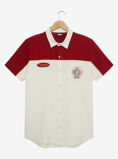 Add some super powered style to your look with this Iron Man-inspired top! Featuring embroidered patches of Tony Stark's name and the Stark Industries logo on the front  the back includes embroidered "Stark Industries" lettering. With a color blocked top  button front  and a pocket  this shirt is perfect for Marvel fans.A BoxLunch Exclusive!51% cotton; 49% rayonListed in unisex sizesWash cold with like colors; dry lowImported Stark Industries Shirt, Iron Man Merch, Retro Cotton Tops With Embroidered Logo, Retro Cotton Top With Embroidered Logo, Stark Industries Logo, Iron Man Stark, Stark Industries, Industry Logo, Marvel Iron Man