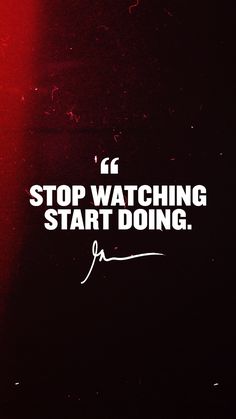 a red light with the words stop watching start doing