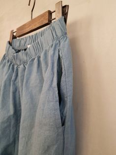 Women's Linen Hemp Banding Waist and Hem Pants Size One size, good for US size 4-12 good up to 34 inches of waist Waist 30cm / 11.8inches Length 86cm / 33.8inches Fabric and Care Linen 50% Hemp 50% Hand washing and line dry recommended Made in S Korea High Waisted Stretch Linen Bottoms, High Waist Stretch Linen Bottoms, High Waist Loose Fit Cotton Capris, High-waist Linen Bottoms With Side Pockets, High Waist Linen Bottoms With Side Pockets, High Waist Cotton Capris With Elastic Waistband, Straight Pants With Hip Pockets For Summer, Summer Straight Pants With Hip Pockets, Summer Baggy Pull-on Bottoms