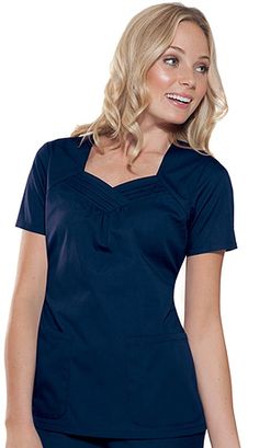 Charming scrub top with a sweetheart neckline and short sleeves along with pleated front crossover neckband <3 Fitted Nursing Top With Short Sleeves, Fitted Short Sleeve Nursing Tops, Uniform Reference, Nursing School Scholarships, School Of Nursing, Spa Uniform, Top Neckline, Scrubs Outfit, Nursing Fashion