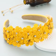 - Applique design
- Rhinestone embellished
- Length: 6.2 inch, Width: 4.9 inch
- Material: 100% Polyester, 100% Zircon Flower Headband, Yellow, Home Jewelry, Design