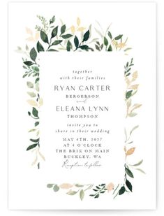 a wedding card with greenery on it