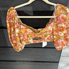 Brand New With Tags Gorgeous Fun Top . Shirt Can Be Worn On Or Off The Shoulder . Cut Out In The Middle Size Is Usa 8 But I Would Say It’s Like A 6 Woman Who Are S/M Yellow Floral Print Party Blouse, Party Yellow Blouse With Floral Print, Shoulder Cut, Nice Tops, Orange Yellow, In The Middle, The Middle, Off The Shoulder, Top Shirt