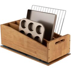 a wooden holder with three knives and two cutting boards in it