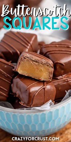 chocolate peanut butter squares in a blue bowl on a wooden table with text overlay