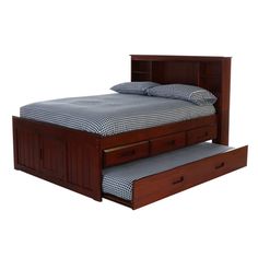 a bed with two drawers underneath it and a night stand on the bottom shelf next to it