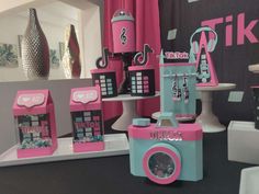 an assortment of pink and blue toys on display