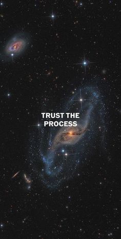 the words trust the process are in front of an image of two spiral galaxys