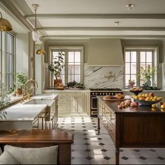 a kitchen filled with lots of counter top space next to a stove top oven and sink