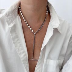 Handmade Pearl Y Necklace | Genuine Pearl Lariat Necklace | Multi Design Necklace | Silver Layering Pearl Necklace Made with genuine pearls and alternating with silver beads. This unique pearl and chain lariat can be worn as a necklace or lariat. Closes with a unique pavè clasp toggle closure. Model is wearing size M - 20" necklace in the photos. ------------------------------- M A T E R I A L S  Freshwater pearls stainless steel silver chain cubic zirconia Thanks for supporting our small busine Pearl Lariat Necklace, Layering Jewelry, Pearl Lariat, Y Necklace, Layered Jewelry, Design Silver, Lariat Necklace, Necklace Silver, Silver Beads