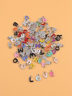 the word love spelled out in letters on a yellow background with black and white lettering