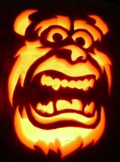 a carved pumpkin with an angry face on it