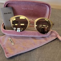 New With Tags Never Worn Miu Miu Mirrored Sunglasses. Come With Hard Case, Soft Carry Case, Microfiber Lense Towel. Modern Miu Miu Sunglasses For Party, Chic Miu Miu Sunglasses For Spring, Chic Miu Miu Spring Sunglasses, Designer Miu Miu Sunglasses For Summer, Miu Miu Designer Sunglasses For Summer, Elegant Miu Miu Sunglasses With Glass Lenses, Designer Miu Miu Sunglasses For Party, Miu Miu Elegant Gold Sunglasses, Miu Miu Luxury Sunglasses For Formal Occasions