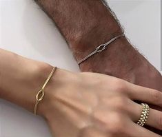 Description:   Love Knot Bracelet - Dainty Couple Bracelets -İnitial Bracelet - İnfinity Bracelet -  Sterling Silver Friendship  Jewelry - Best Friend Gift -  Gift for Couples - Love Knot Bracelet -   Personalized Bracelet   - Couples Jewelry   - Gift for mom - Love Knot Bracelet  -  Couple Bracelet -  Boyfriend Girlfriend Matching - Unisex Bracelet -  Love Knot Soulmate - Couples Bracelet - Birthday Gift - Bridesmaid Gift - Anniversary Gift - Valentines Gift -  --Our product is produced with care from 925 carat high quality silver. Snake chain is used in double bracelets. Our Bracelets:       Bracelet Length : 6.8 inch + 2 inch Extension ring (17 CM+5 CM)                       *Love Knot Necklace :16 İnch + 2 İnch Extension Ring     (40 CM+5 CM) -It is suitable for daily use. -All your or Him And Her Bracelets, Promise Bracelet For Couples, Engagement Bracelets, Matching Boyfriend, Boyfriend Jewelry, Matching Jewelry For Couples, Love Knot Bracelet, Bracelet Boyfriend, Bracelet Couples