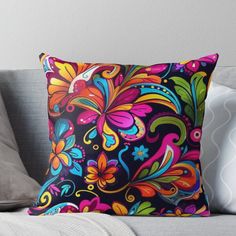 a colorful floral design on a black background throw pillow