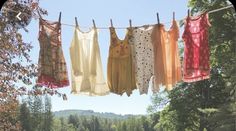 clothes hanging on a line outside in the sun