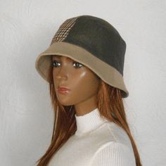 Size 57-58 cm  Women's bucket hat. This is a fashionable and stylish hat for the cold season. Winter hat with small brim. The women's hat is made of checkered fabric and monochrome brown fabric with a slight shiny effect.   Beautiful combination of colors - beige and brown.  Hat with warm lining.  Size 57-58 cm Trendy Brimmed Cloche Hat For Winter, Brown Bucket Hat For Fall, Brown Reversible Bucket Hat With Curved Brim, Adjustable Short Brim Bucket Hat For Fall, Brown Wide Brim Bucket Hat For Winter, Casual Winter Bucket Hat With Short Brim, Brown Brimmed Cloche Hat For Outdoor, Casual Cloche Hat For Fall, Casual Winter Fedora For Outdoor