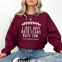 Stay cozy and stylish with the "I Just Hope Both Teams Have Fun" sweatshirt, a cute football sweater that's the ideal sports mom gift for gameday, halftime, and tailgating fun! Prefer this design on a T-Shirt? Visit this link: https://bohemianbloomdesigns.etsy.com/listing/1669765879 Everything You Need to Know: 🧥 Sweatshirt Brand Gildan | Unisex Adult Sizing | 50% Cotton, 50% Polyester ⏳🚚 Production & Shipping All items are made-to-order. They will ship within 1-5 business days from one of our Sporty Team-colored Sweatshirt For Football Season, Sporty Fall Sweater With Slogan, Game Day Crew Neck Sweater For Sports Season, Football Season Long Sleeve Sports Sweatshirt, Football Season Long Sleeve Sweatshirt, Team Spirit Letter Print Sweatshirt For Football Season, Football Season Team Spirit Letter Print Sweatshirt, Long Sleeve Football Season Sweatshirt, Varsity Letter Print Sweater For Game Day