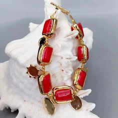 "Coral Radiance ~ Handmade 18k Gold-Plated Bracelet" Adorn your wrist with our exquisite handmade bracelet--a fusion of elegance and natural allure. Crafted from 18k gold-plated copper, this adjustable piece features irregularly shaped beads and vibrant red coral nuggets. Whether you're dressing up for an event or adding a touch of charm to your everyday look, this bracelet embodies the warmth of coral reefs and the luxury of gold. 🌟✨ Key Details: ~Gems Info: Red Coral. Gold Plated Charm. ~Diam Gold Key, Bridesmaid Gifts Jewelry, Jewelry Bridesmaid, Coral Reefs, Gold Plated Bracelets, Red Coral, Bridesmaids Gifts, Handmade Bracelets, X 23