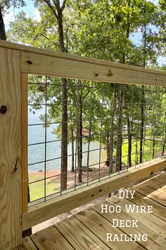 a wooden deck with metal wire railings and trees in the background text reads diy hog wire deck railing