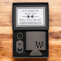 the grooms gift set includes a bottle opener, wallet and keychain