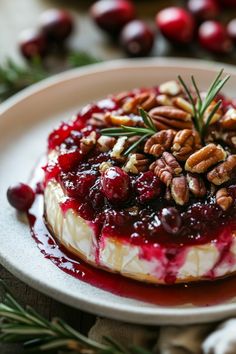 Delight your guests this holiday season with baked brie with cranberries and pecans! This decadent brie cheese appetizer melts in the oven, blending creamy cheese with tart cranberries and crunchy pecans. Drizzle with honey for an extra touch of sweetness that makes it a holiday favorite. Whether you're planning Christmas appetizers easy enough for any skill level or simply looking for holiday appetizers, this brie recipe is sure to impress. Baked Cranberry Brie Recipes, Brie Cheese Cranberries Puff Pastry, Brie Recipes Christmas, Candied Pecan Brie Bites, Brie Jelly Appetizer, Easy Baked Brie Appetizer, Brie Cheese Cranberry Appetizer, Baked Brie Christmas Wreath, Baked Brie With Cranberries And Pecans