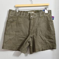 Dakota Blue Women's Short Mid Rise Pockets Flap With Button Soft Stretch Casual Fit Mid Rise Color : Olive Measurement Is For Reference Only Inseam ( In): 5.75 Content : 97% Cotton 3% Spandex Khaki Bottoms With Buttons, Casual Khaki Button-up Bottoms, Mid-rise Cotton Shorts With Buttons, Casual Workwear Shorts With Button Closure, Mid-rise Cotton Shorts With Button Closure, Chino Shorts Women, American Eagle Jean Shorts, Chambray Shorts, Y2k Shorts