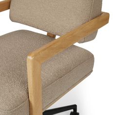 an office chair with a wooden armrest and seat cushion, viewed from the front