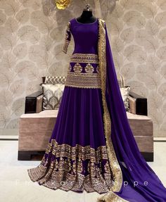 Made to Order/Measurement/Custom Order Lehenga - Color : purple  - Fabric : embroidered Georgette  - Fully flared paneled lehenga -   Attached  Dupatta with Blouse - Drawstring closure with Tassels - - It can be customize in any design or size  PLEASE NOTE: BUYERS ARE RESPONSIBLE FOR ANY CUSTOMS AND IMPORT TAXES THAT MAY APPLY. This is a made to order product. If you opt for 'Made To Measurement Option', we will provide a measurement template and you can share the measurements likewise. If you want to opt for 'Standard Size', Please refer to the size chart provided in the listing. Shipping: Standard Shipping is done by DHL ecommerce and it mostly takes 2 to 3 weeks to deliver after dispatch. Express Shipping is done by DHL express and it mostly delivers within a week after dispatch. Fabric Purple Garara Dress, Purple Sharara Designs, Purple Palazzo Set With Dori Work For Wedding, Purple Wedding Palazzo Set With Pallu, Purple Palazzo Set With Pallu For Wedding, Traditional Drape Purple Palazzo Set For Wedding, Purple Traditional Drape Palazzo Set For Wedding, Purple Georgette Palazzo Set For Wedding, Wedding Navratri Purple Palazzo Set