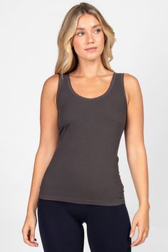 Classic tank made cozy. Soft, plush ribbing makes this the perfect top to layer this fall/winter while the lacey details elevate this style to make "the everyday" more special. Versatility in reversibility! Wear as a v-neck or scoop neck. Fall Tops With Lace Trim For Loungewear, Lace Trim Tops For Fall Loungewear, Fall Loungewear Tops With Lace Trim, Casual Camisole With Lace Trim For Layering, Casual Lace Trim Camisole For Layering, Seamless Tank Top For Layering In Fall, Sleeveless Tops With Crochet Trim For Layering, Fitted Tops With Crochet Trim For Layering, Fall Tops With Crochet Trim For Layering