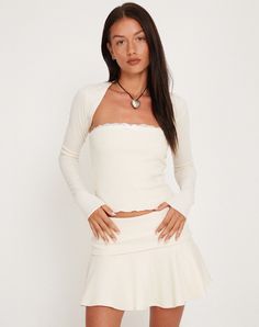 Ivory Rib Shrug Top | Suri – motelrocks-com-us Old Money Woman Outfit, Shrug Outfit, Low Waist Skirt, Tube Top And Skirt, 2000s Clothing, Long Sleeve Shrug, Turtle Neck Crop Top, Crop Top Set, Camisole Dress