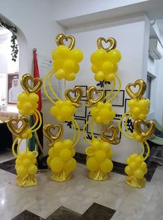 balloons are arranged in the shape of hearts