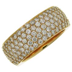 This fabulous Cartier 5-row wide band ring is crafted in 18k yellow gold and pave-set with brilliant-cut round D-E-F VVS1-VVS2 diamonds weighing an estimated 2.0 carats. Made in France circa 2020s. Measurements: 0.31" (8mm) width. The ring size is 6.75 - EU 54. Non-resizable. Excellent condition. Comes with original box and paperwork. Luxury Cartier Yellow Gold Rings, Luxury Cartier Round Band Jewelry, Wide Band Ring, Gold Band Ring, Ring Pictures, Wide Band Rings, Wide Bands, Diamond Color, Gold Band