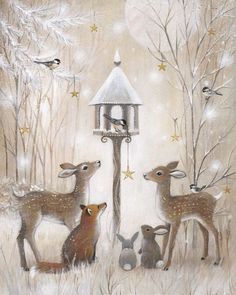 three deer are standing in the snow near a lamp post with birds flying around it