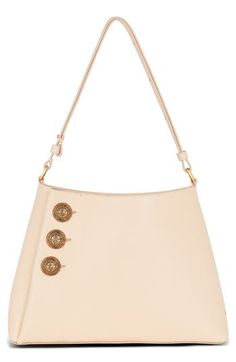 Crest-embellished buttons inspired by the label's ready-to-wear collection detail the sides of this grained leather shoulder bag in a triangular silhouette. Magnetic closure Shoulder strap Interior zip pocket Unlined Leather Made in Italy Designer Handbags Formal Beige Shoulder Bag With Logo Hardware, Designer Cream Shoulder Bag With Branded Hardware, Designer Top Handle Shoulder Bag With Snap Closure, Luxury Leather Shoulder Bag With Snap Closure, Designer Shoulder Bag With Top Handle And Snap Closure, Elegant Beige Shoulder Bag With Logo Hardware, Chic Beige Shoulder Bag With Logo Hardware, Luxury Formal Shoulder Bag With Snap Closure, Luxury Shoulder Bag With Snap Closure