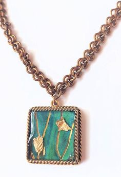 From our Mixed Media Collection, the "Field of Gold" 24k gold-plated pewter 1" square pendant features glass-like resin on one side and reverses to a lush floral motif. Suspended from a handcrafted brass chain, this unique one-of-a-kind pendant necklace lends a touch of whimsical charm to any outfit.  The 18" handmade jeweler's brass chain is woven with brass jump rings and finished with a 24k gold-plated pewter toggle clasp. * Signature SUZANNA charm. * Arrives in a black satin drawstring stora Gold Digital Art, Fields Of Gold, Unique Pendant Necklace, Satin Noir, Bezel Pendant, Square Pendant, Unique Pendant, Storage Pouch, Toggle Clasp