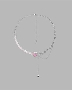 Details: Silver necklace with pearl beads and pink heart gemstone Trendy Pearl Chain Necklace For Valentine's Day, Pink Heart Pendant Clavicle Necklace, Heart-shaped Pearl Beaded Chain Jewelry, Heart-shaped Pearl Chain Necklace For Parties, Trendy Heart-shaped Pearl Chain Necklace, Heart Shaped Pearl Charm Necklace For Party, Heart-shaped Pearl Charm Necklace For Party, Pink Necklace With Heart Beads For Party, Pink Heart Beads Necklace For Party