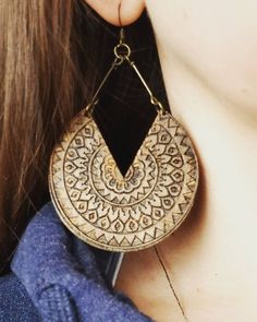 Experience the allure of our V Tribal Cut Out Wood Dangle Boho Earrings, carefully handcrafted with exquisite attention to detail. Made from lightweight wood, these earrings showcase a perfect blend of boho and modern aesthetics. Prepare to receive countless compliments on the stunning engraved mandala texture and captivating color of these earrings, featuring a luxurious espresso stain. Despite their lightweight feel, these earrings are durable and effortlessly elevate any outfit with their neu Wood Mandala, Mandala Wood, Large Dangle Earrings, Wood Dangle Earrings, Mandala Earrings, Engraved Earrings, Floral Cocktails, Oversized Earrings, Bronze Earrings