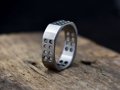 Put this on your finger and you'll never want to take it off! The technically challenging machined design is super comfortable on your finger because of the ultra low profile square shape, and you're sure to stand out since the style is unlike anything else out there! Titanium is hypoallergenic and can even be worn by people with severe metal allergies! Typically ships within weeks, not months like some! Every Richter Scale ring is covered by our 100% Guarantee --About the Ring-- About This Ring Richter Scale, Mens Wedding Rings Titanium, Mens Rings, Titanium Wedding Band, Men's Wedding Ring, Big Rings, Detailed Ring, Diy Rings, Wide Rings