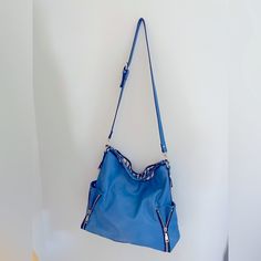 Excellent Condition Never Used Beautiful Blue Color Great Leather Material Blue Tote Shoulder Bag With Zipper Closure, Blue Hobo Bag For Shopping, Trendy Blue Hobo Bag For Travel, Casual Blue Hobo Bag With Zipper Closure, Casual Blue Hobo Bag For Shopping, Blue Spring Hobo Shoulder Bag, Blue Shoulder Bag With Zipper For Shopping, Trendy Blue Hobo Tote Bag, Blue Shoulder Bag With Zipper Closure For Shopping