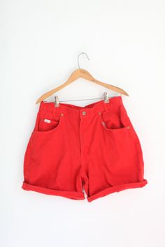 "maker: chic material:cotton used vintage condition actual measures: waist: 30\" thigh: 12\" across hips:24 1/2\" across rise:12 1/2\" inseam: 7\" total length:18\"" Casual High Rise Red Jean Shorts, Red High Waist Cotton Shorts, Red Jean Shorts With Pockets For Spring, High Waist Red Cotton Shorts, Retro Red Shorts With Pockets, Red High-waisted Jean Shorts For Spring, Red High-waist Cotton Jean Shorts, Casual High Waist Red Jean Shorts, Red Cotton Jean Shorts