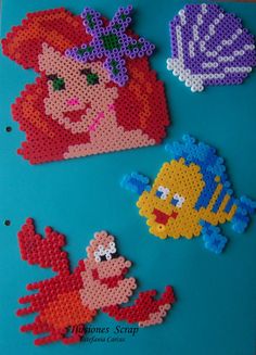 the little mermaids have been made out of perler beads and are ready to be sewn together