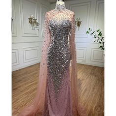 Gold Muslim Mermaid Evening Dress with Elegant Cape Sleeves - Beaded Luxury Dubai Gown for Women's Party (2024) Royal Dresses Queens Gowns, Royal Dresses Queens, Queen Gown, Dubai Evening, Elegant Cape, Cape Gown, Gold Mermaid, Royal Dresses, Queen Dress