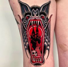 a person with a tattoo on their thigh