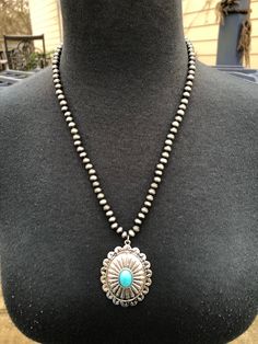 Faux Navajo Pearl necklace with concho pendant Necklace measures approximately 20" with 3" extender Vintage Concho Necklaces For Festivals, Southwestern Concho Necklaces For Western Events, Vintage Concho Necklace For Festival, Adjustable Southwestern Style Pendant Necklace, Southwestern Style Adjustable Pendant Necklace, Western Style Silver Necklace For Festivals, Western Silver Turquoise Necklace With Concho, Silver Southwestern Concho Necklace, Southwestern Style Necklace With Large Round Pendant