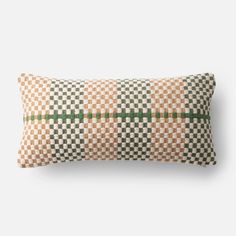 an orange and green checkered pillow on a white background