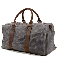 "Versatile and stylish, this handmade waxed canvas duffle bag is a timeless classic travel essential. This bag is made of waterproof durable canvas and top quality genuine crazy horse leather trim. You will be surprised at this travel bag's size. The roomy interior, and various inner pockets, this bag is perfect for a weekend away or a week-long trip. It is perfect as a carry-on flight bag. Featuring a collapsible shoe compartment, your shoes can rest in that separate compartment so you never have to risk soiling your clothes.  This fashion duffel bag also fit for men and women, it's perfect for a short getaway to be carried as a cabin bag yet big enough to accommodate everything you need for longer trips. In short, we offer this bag to be an understated, loyal and strong companion on your Vintage Cotton Bag With Waxed Finish, Rectangular Waxed Canvas Duffle Bag For Overnight Trips, Waxed Canvas Travel Bag For Overnight Trips, Casual Weekender Bag With Waxed Finish For Travel, Canvas Weekender Bag With Waxed Finish For Overnight Trips, Cotton Duffle Bag With Luggage Sleeve For Daily Use, Vintage Canvas Travel Bag For Everyday Use, Waxed Finish Satchel Duffle Bag For Everyday Use, Casual Waxed Finish Weekender Bag For Travel