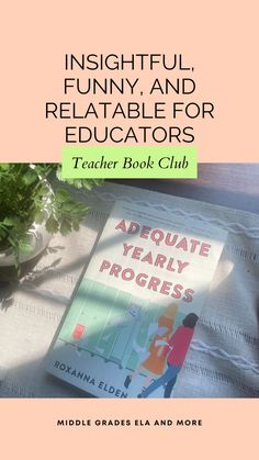 a book that is sitting on top of a table next to a potted plant